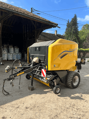 Presse à balles rondes New Holland RB 125 - 1